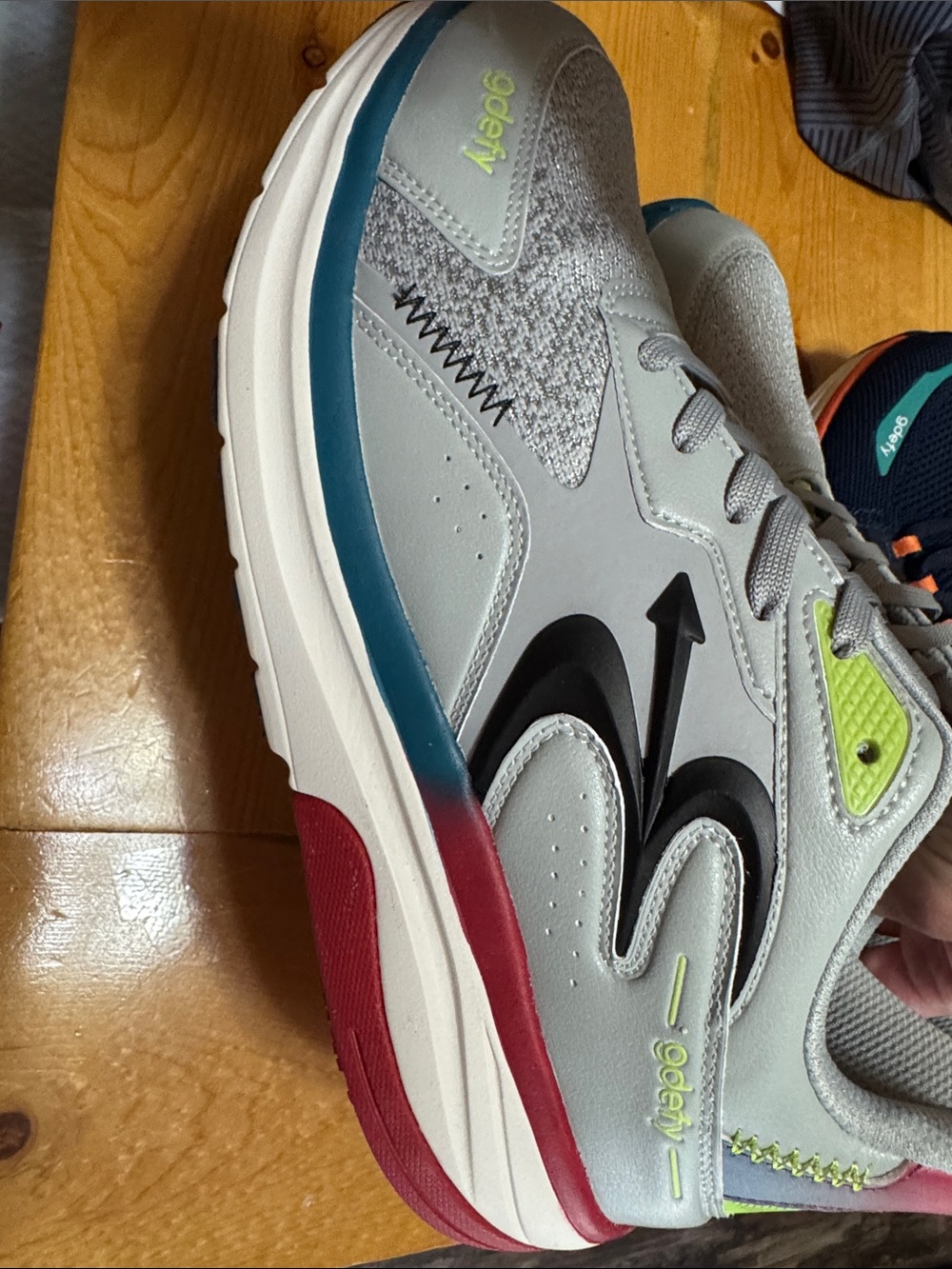Gdefy Grey Athletic Sneakers with Black Swoosh and Lime Accents